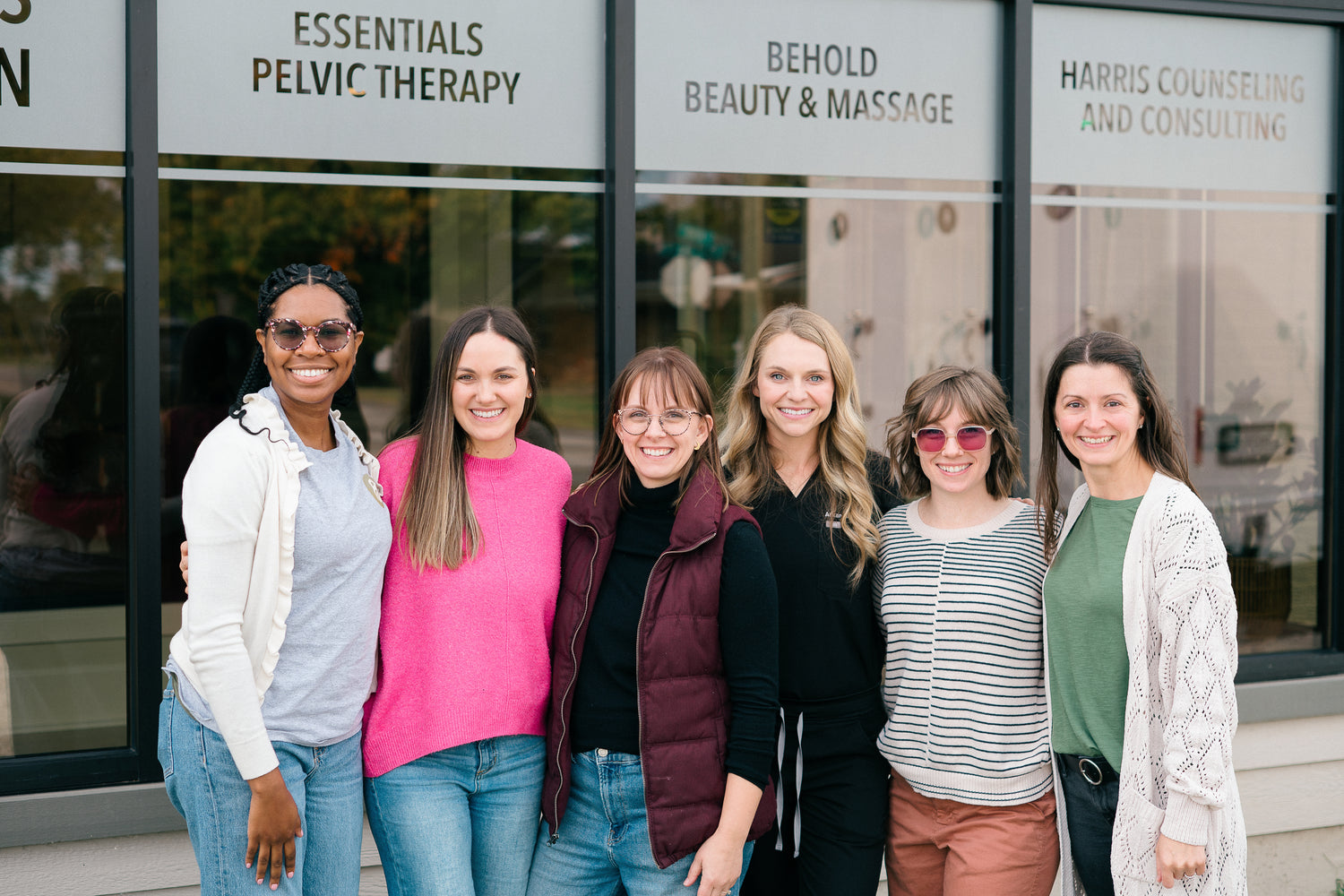 Group of six women standing outside Bentonville's Maternal Hub.